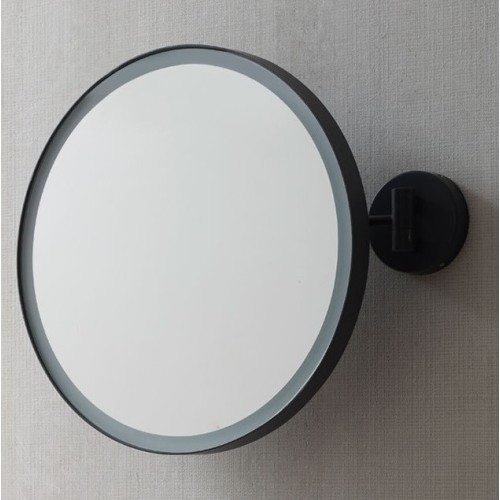 Pluto is a round mirror with light of the sky brand | Terracerámica