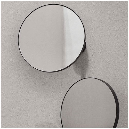 Pluto es un espejo redondo de la marca Cielo | Terracerámica